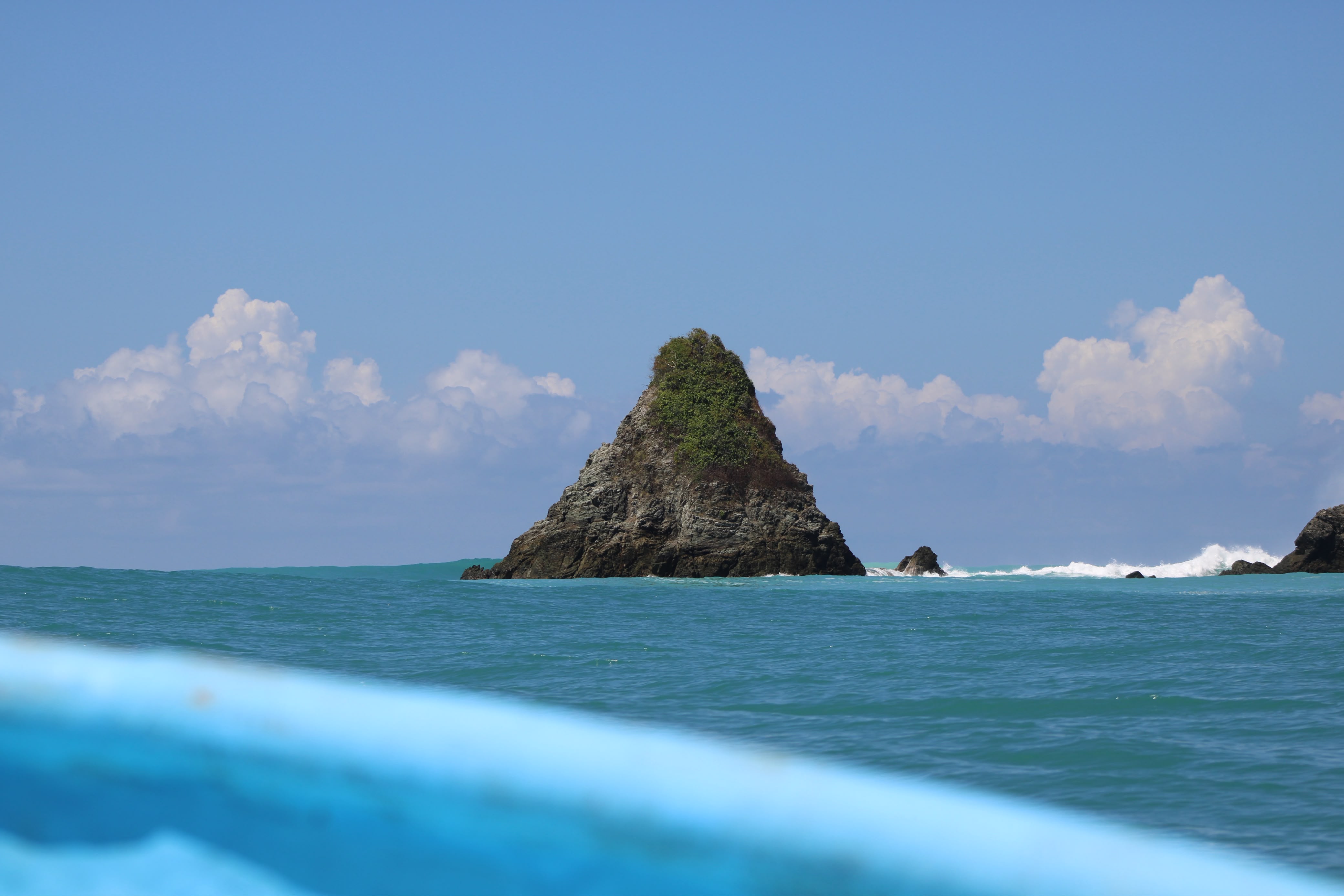 A rock sea stack off the Matapalo point seen from the water