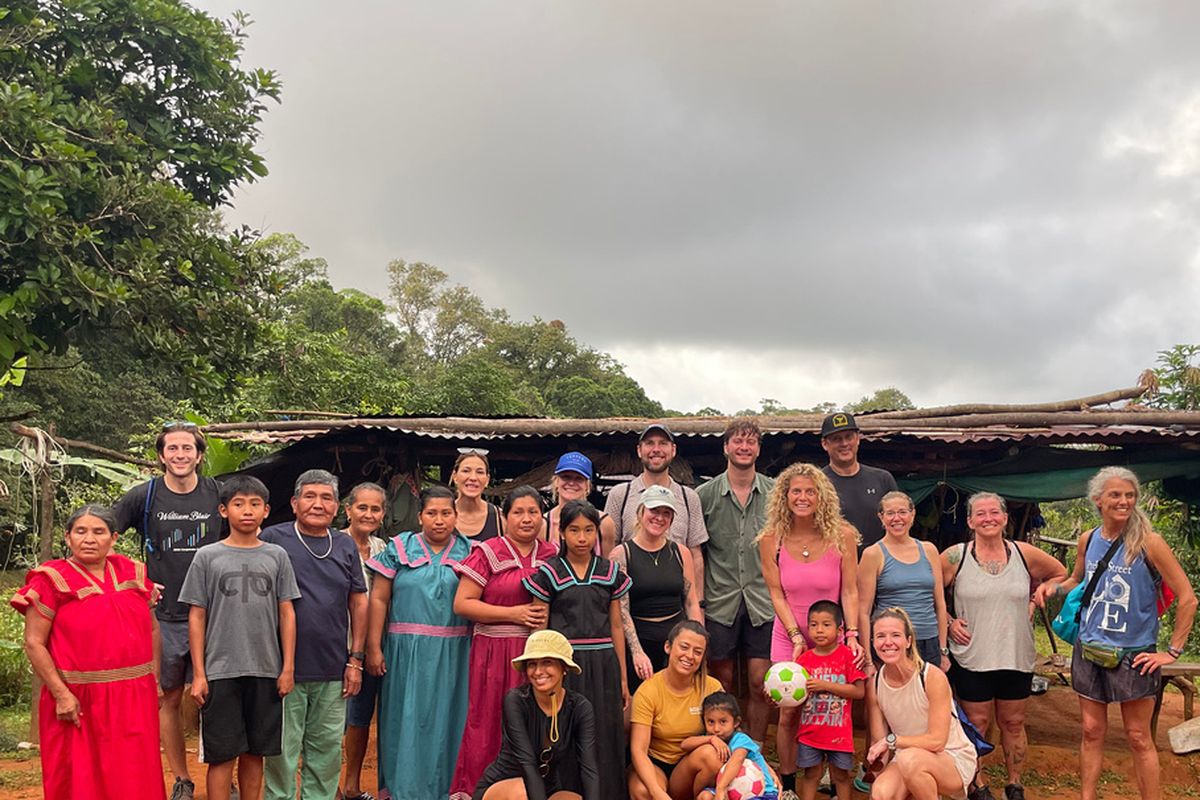 Visitors and Ngäbe-Buglé community members together on a cultural tour near Pavones