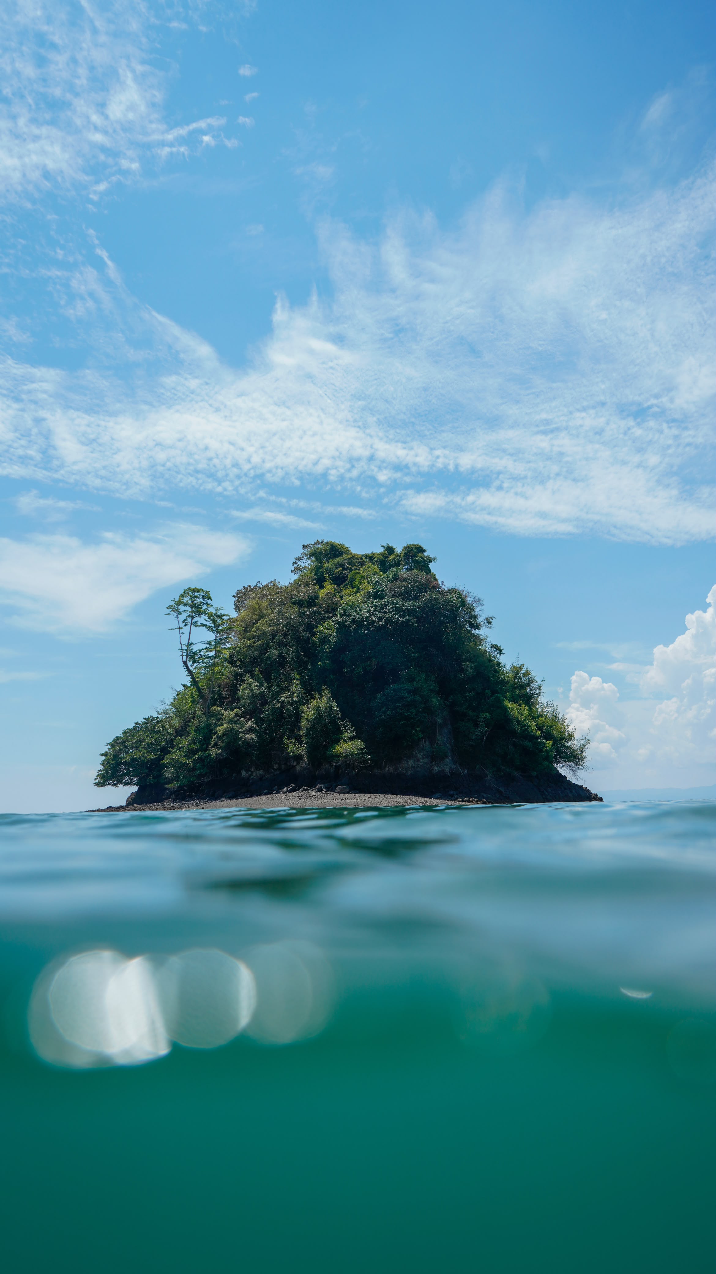 A jungle island photographed from the waterline in Golfo Dulce