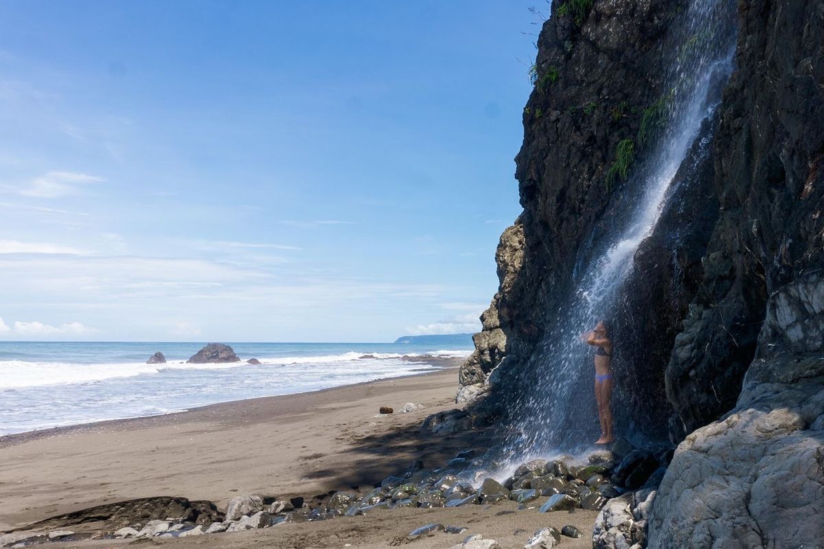A waterfall falling directly onto the beach at Punta Banco, south of Pavones